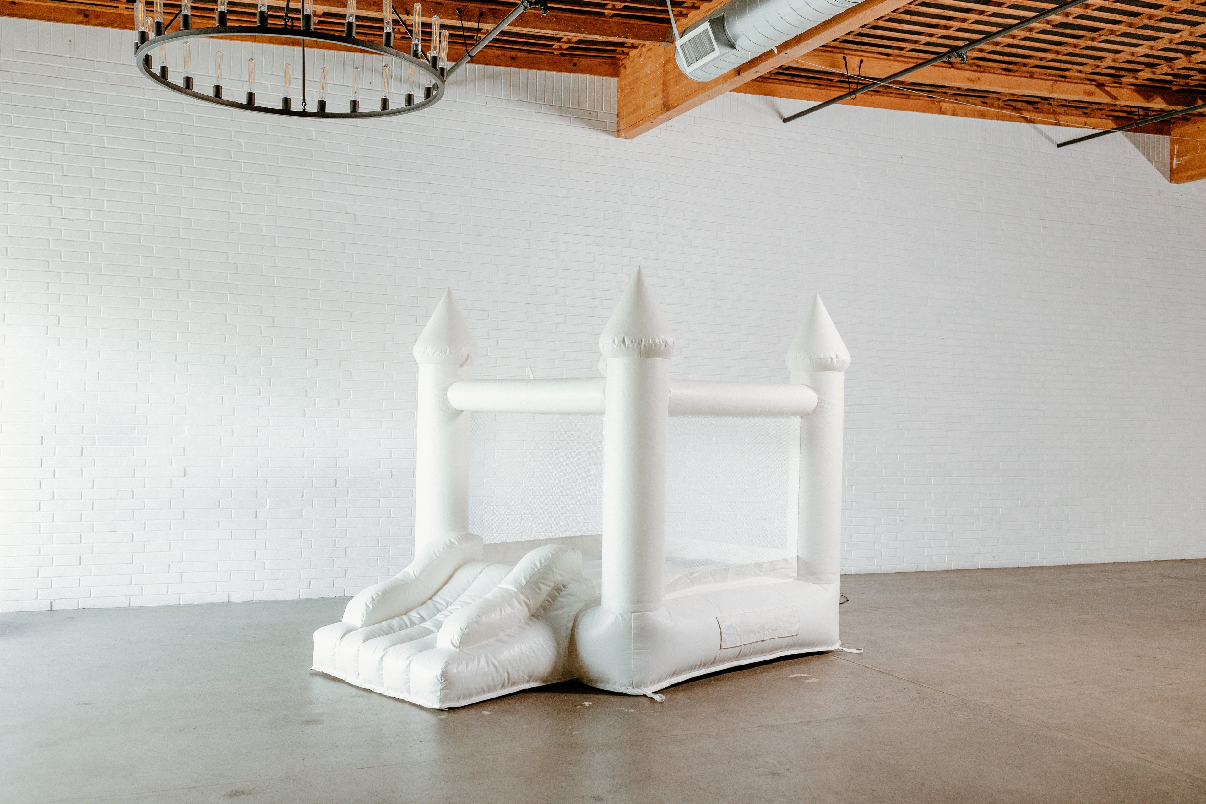 Mini Ava - White Bounce House with Cone Tops